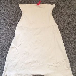 SPANX slip, like new, beige. Knee length.